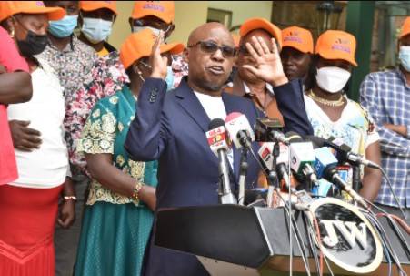 DM presidential Jimi Wanjigi (centre) addresses a press conference at his Kwacha offices in Westlands, Nairobi.
