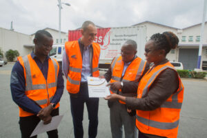 (Left to right) Julius Achach - Business Development Manager (AGS), Thibault Malezieux - Managing Director (AGS), Collins Mutimba - Secretary General - Kenya Association of Records Managers and Archivists (KARMA) and Maurene Kenga - Member (KARMA) shares a light moment during a courtesy call to AGS Worldwide Movers to discuss partnership opportunities in records management and data protection.